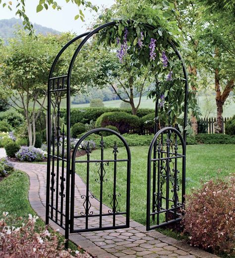 Our Diamond Finial Arbor is made of sturdy, 1-1/4" tubular steel with vertical pickets adorned with solid steel scroll-work and finials. Protected by an exterior-grade, black powder-coat finish with stainless hardware throughout, it will retain its beauty for years outdoors. The Arbor arches gracefully and provides a stunning focal point alone or with fencing; Arbor with Gate features a latching gate; both include built-in ground stakes. Arbor With Gate, Garden Arbor With Gate, Trellis Diy, Iron Garden Gates, Arbors Trellis, Arch Trellis, Diy Trellis, Garden Arbor, Garden Arches