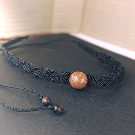 🌸✨ Cozy Vibes Alert! ✨🌸 A black macrame choker with a radiant 𝓼𝓾𝓷𝓼𝓽𝓸𝓷𝓮 bead. Perfect for adding a touch of elegance to any outfit. 🌞🖤 : ¨·.· ¨: `· .. ·` #MacrameChoker #Sunstone #HandmadeJewelry #BohoStyle #MacrameJewelry #HandmadeJewelry #BohoJewelry #knitting #MicroMacrame #handmadejewelry #jewelry #macrame #necklace #crystaljewelry #necklace #jewellery #artjewellery #bracelets #macrameart #handmade #macramelove #handmadejewlery #handmadewithlove #art #micromacramejewelry Macrame Necklace For Men, Macrame Choker, Black Macrame, Handmade Jewlery, Macrame Art, Macrame Necklace, Cozy Vibes, Micro Macrame, Macrame Jewelry