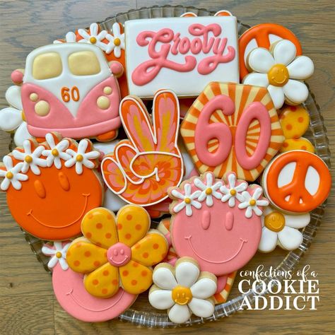 Happy 60th birthday, you groovy kids!! #acookieaddict #groovycookies 60th Birthday 60s Theme, Groovy 60th Birthday Party, 70s Cookies, 60s Themed Birthday Party, Groovy Cookies, Happy Birthday 60, Moms 60th, 60s Theme, Surprise 60th