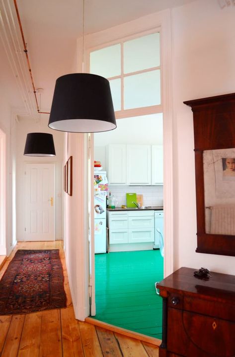 A Berlin Kitchen With a Glossy Green Floor | Kitchn Kitchen Green Floor, Kitchen Spotlights, Classic Apartment, Chambre Inspo, Painted Wood Floors, Green Floor, Berlin Apartment, Kitchen Green, Global Home