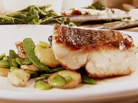 Get Anne Burrell's Seared Wild Striped Bass with Sauteed Spring Vegetables Recipe from Food Network Striped Bass Fish Recipes, Striped Bass Recipes, Stripped Bass Recipes Baked, Striped Bass Recipe, Spring Vegetables Recipes, Sea Bass Recipes, Ginger Miso, Striped Bass Fishing, Spring Veggies