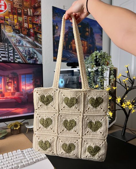 love this crochet heart bag 💚 even though it felt like it took forever to make I can’t believe I’m planning another granny square bag so soon after this one 😭 but it’s going to be beautiful #crochettotebag #crochethearts #grannysquares Granny Square Tote Bag Pattern Free, Heart Granny Square Bag, Crochet Tote Bag Granny Squares, Granny Square Bag Crochet Pattern, Heart Crochet Bag, Crochet Heart Bag, Crochet Granny Square Tote Bag, Heart Granny Square, Granny Square Tote Bag