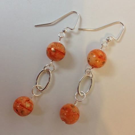 Handcrafted Beaded Pierced Dangle Earrings. Orange Swirl Ceramic Beads. Silver Metal Oval Hoop Rings & Earwires. Approx. 2 1/2" Long. New With Tag. Homemade Bead Earrings, Trendy Earrings 2024, Unique Jewelry Inspiration, Simple Bead Earrings, Ceramic Bead Jewelry, Handmade Bead Jewellery, Pearl Earrings Handmade, Beautiful Beaded Jewelry, Unusual Earrings