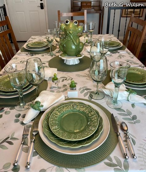 A Spring Tablescape with Frogs, table setting, more information about everything on this table in my blog post about it all here: https://www.whispersoftheheart.com/blog/2022/3/13/frogs-on-a-spring-tablescape Frog Centerpiece, Frog Table, Tiny Frogs, Frog Tea, Frog Cookies, Country Sampler Magazine, Green Dinner Plates, Garden Frogs, Country Sampler