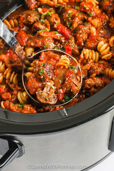 Crockpot sausage pasta is loaded with veggies, sausage, & pasta! Toss everything together before leaving for work, and come home to a delicious, hearty meal the whole family will love. #spendwithpennies #crockpotsausagepasta #recipe #entree #maindish #pasta #crockpot #slowcooker #easy #hearty #penne Elbow Pasta Recipes, Pasta Crockpot, Sausage And Peppers Crockpot, Sausage Crockpot Recipes, Crock Pot Sausage, Sausage And Peppers Pasta, Crockpot Sausage, Sausage Crockpot, Creamy Tomato Pasta