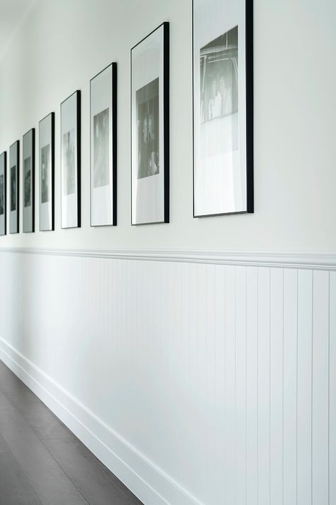 Hamptons West Coast - Intrim Mouldings Hamptons Photo Wall, Wainscoting Lounge Room, Hamptons Feature Wall, Hampton Wall Panelling, Painted Vj Panelling, Hamptons Panelling, Vj Panel Hallway, Classic Hamptons Style Interiors, Hamptons Wall Panelling