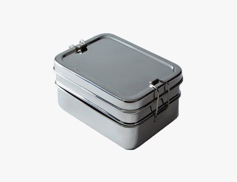 Modern-Metal-LunchboxThis metal lunchbox is the smallest of the list, intended for a miniature three-course mid-day snack. Don’t let the size fool you: the stainless steel protects the food within from getting crushed and is easy to clean. There are two layers that clasp together for neat transportation, and a small container for condiments that can fit within. School Lunch Room, Lunch Boxes For Men, Adult Lunches, Cool Lunch Boxes, Lunch Room, Mens Gear, You Better Work, Mission Style, Small Containers