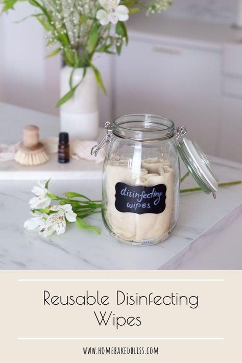 Kick germs to the curb with these reusable disinfecting wipes, that are easy to make and environmentally friendly. | homebakedbliss.com Reusable Disinfecting Wipes, Homemade Wipes, Diy Cleaning Wipes, Wipes Diy, Homemade Cleaner, Large Glass Jar, Natural Stone Countertops, Diy Cleaning Solution, Disinfecting Wipes