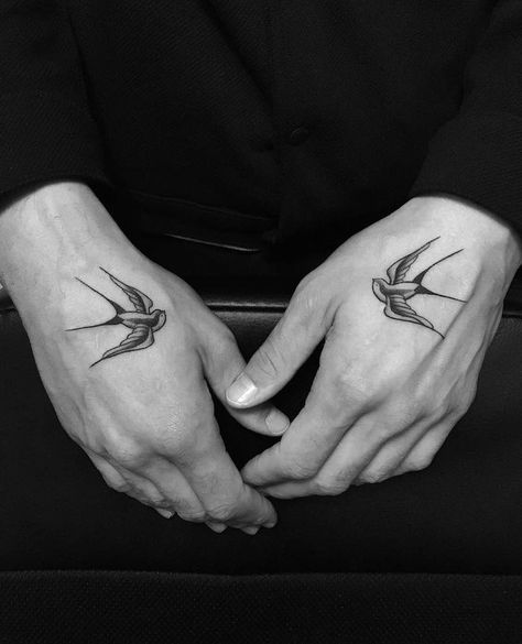 A swallow tattoo is a great addition to any ink enthusiast’s collection. Swallows are part of a family of birds Bird Tattoo On Hand, Small Swallow Tattoo, Tattoos On Hands, Swallow Hand Tattoo, Swallow Tattoo Meaning, Swallow Bird Tattoo, Traditional Swallow Tattoo, Bird Hand Tattoo, Swallow Tattoos