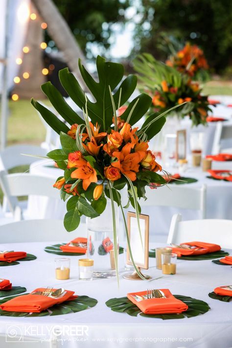 Simple Tropical Tablescape, Wedding Tropical Centerpieces, Tropical Tablescape Centerpiece Ideas, Vintage Florida Wedding Decor, Tropical Wedding Reception Table, Tropical Leaf Centerpiece, Tropical Floral Arrangements Table Centerpieces, Tropical Glam Wedding Table Settings, Tropical Theme Wedding Reception