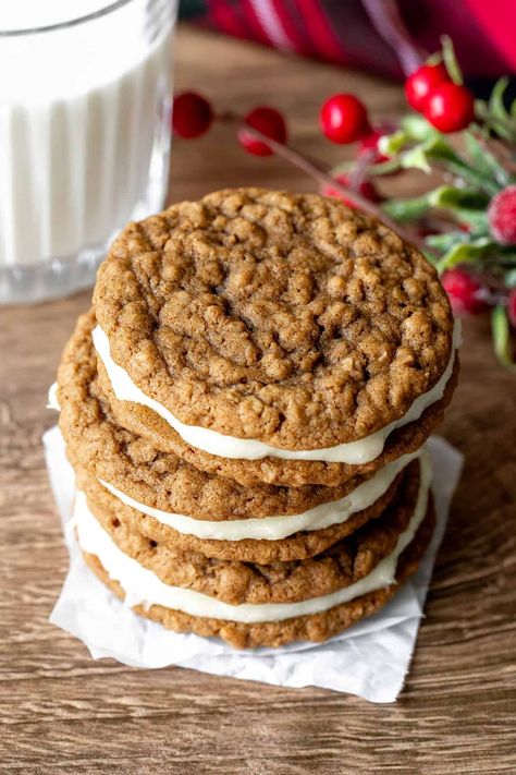 A delicious twist on classic Lil' Debbie cream pies - these gingerbread oatmeal cream pies feature two soft gingerbread oatmeal cookies and tangy cream cheese frosting in the middle. #gingerbreadoatmealcreampies #gingerbreadcreampies #gingerbreadoatmealsandwichcookies from Just So Tasty Gingerbread Oatmeal Cream Pies, Gingerbread Oatmeal Cookies, Gingerbread Oatmeal, Oatmeal Cream Pie, Lil Debbie, Soft Gingerbread, Soft Gingerbread Cookies, Oatmeal Cream Pies, Delicious Christmas Cookies