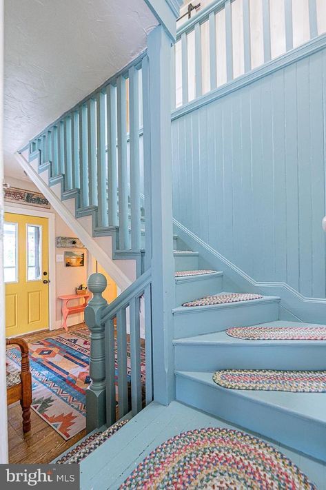 Blue Stair Railing, Stairwell Paint Ideas, Blue Staircase, Colorful Stairs, Staircase Paneling, Yellow Kitchen Cabinets, Open Trap, House Color Palettes, Painted Stairs