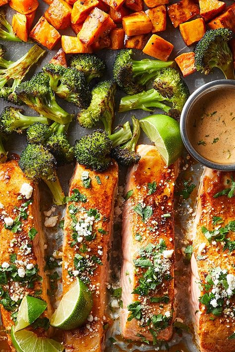 This Sheet Pan Salmon with Sweetpotatoes and Broccoli is easy-to-make and bursting with flavor and good-for-you nutrition. We❤️ it! Thank you Eating Well Magazine! #sweetpotato #salmon #sheetpandinner Salmon Sweet Potato Sheet Pan, Sheet Pan Dinners Broccoli, Eating Well Sheet Pan Recipes, Salmon Sweet Potato Broccoli, Sheet Pan Salmon Broccoli And Potatoes, Salmon Sheet Pan Dinner Sweet Potato, Lemon Roasted Salmon With Sweet Potatoes And Broccoli, One Sheet Pan Salmon And Veggies, Sheetpan Salmon And Broccoli