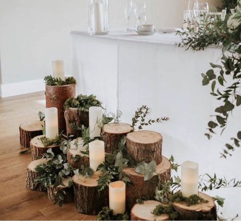 Simply logs, candles and foliage creates the most amazing woodland displays at Doxford Barns Wood Log Wedding Decor, Rustic Wedding Top Table, Forest Wedding Signs, Log Table Centre Pieces, Main Table Wedding Decoration, Muskoka Elopement, Woodland Display, Wood Centerpieces Wedding, Main Table Wedding