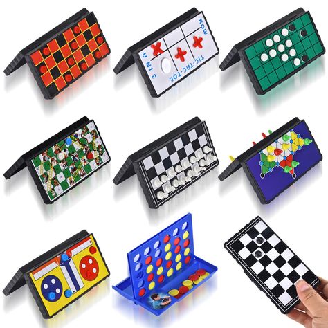 PRICES MAY VARY. 【8 in 1】Experience our 8-in-1 magnetic board game, this ultimate folding board game set includes chess, Checkers, Reversi, Snakes and Ladders, Ludo, 4 in a Row Game, Tic Tac Toe, and Chinese checkers. All the game parts are contained in the box. 8 classic games in one for more fun. 【Magnetic travel board game】There are magnetic pieces at the bottom of the pieces, which can firmly grasp the board, but there is no great resistance when moving. Magnets can keep pieces on the board Board Game Birthday Party, Mini Board Games, Morning Centers, Babysitting Bag, Pnp Games, Board Game Party, Party Games For Kids, Folding Board, 4 In A Row