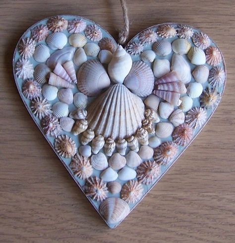 Seashell angel mosaic heart Angel Mosaic, Shells Decor, Mosaic Hearts, Mosaic Heart, Art Coquillage, Shells Diy, Shell Crafts Diy, Stick Art, Apple Logo Wallpaper