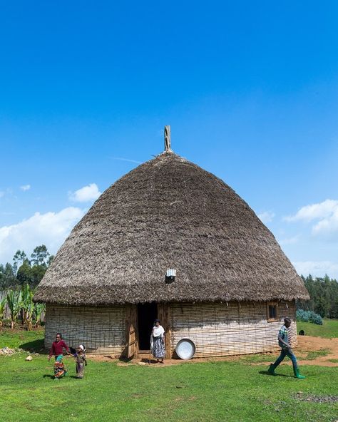 People in front of a Gurage traditional house with thatched roof, Gurage Zone, Butajira, Ethiopia  by Eric Lafforgue #africa #angola #moçambique #ethiopia #namibia #southafrica #kenya #papuanewguinea #saudiarabia #malekula #vanuatu Gurage Ethiopia, Eric Lafforgue, Film Photography 35mm, Thatched Roof, Underwater Photos, Traditional Home, Underwater Photography, Vanuatu, Vintage Photographs