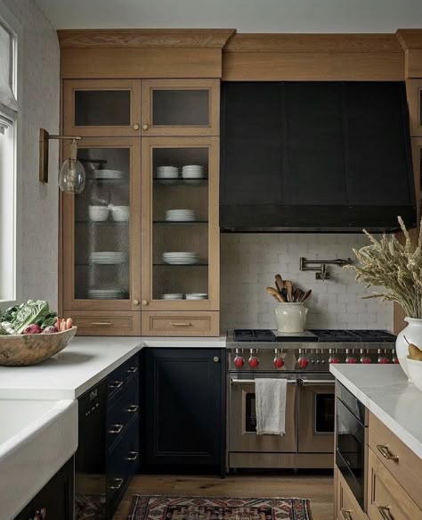 Two toned kitchen cabinets are a gorgeous design trend and we're sharing 17 of our favorite kitchens for inspiration! Kitchen Storage Islands, Modern Ski Chalet, Two Toned Kitchen Cabinets, Two Tone Kitchen, Farmhouse Kitchen Design, Dark Cabinets, Black Cabinets, Modern Farmhouse Kitchens, Black Kitchens