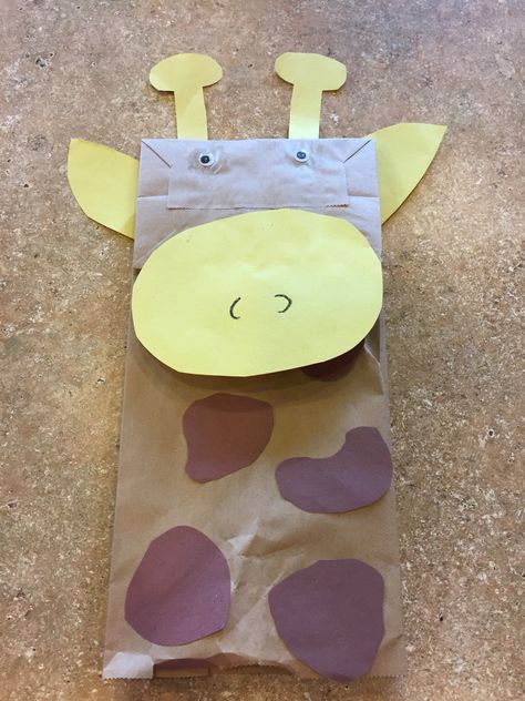 Giraffe paper bag puppet Paper Bag Zebra Craft, Giraffe Paper Bag Puppet, Paper Bag Giraffe Craft, Giraffes Can't Dance Activities Preschool, Paper Bag Activities, Paper Bag Giraffe, Giraffe Craft, Safari Crafts, Giraffe Crafts