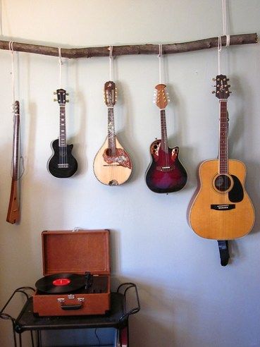 An idea for hanging musical instruments Hang Guitar On Wall, Guitar Hanging Ideas, Hanging Guitars, Guitar Storage, Home Music Rooms, Music Corner, Guitar Room, Recording Studio Home, Music Studio Room