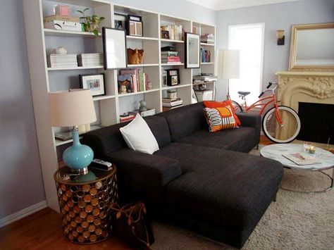 Always an option to put a book shelf behind our couch! Shelves Behind Couch, Bookcase Behind Sofa, Shelf Behind Couch, Shelves Above Couch, Furnitur Ruang Keluarga, Modern Family Rooms, Behind Couch, Above Couch, Living Room Shelves