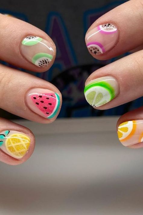 Get ready for summer with these bright and fun nail colors! Choose from lemon yellow, watermelon pink, or juicy orange. Perfect for soaking up the sun and adding a pop of color to your look. #summernails #nailinspiration #brightcolors #manicure Lime Nail Art, Nails Fruit Summer, Nails Fruits Design, Fruits On Nails, Summer Fruit Nail Art, Summer Nails Designs Fruits, Lime Nails, Fruit Nail Designs, Deco Fruit