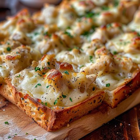 Get ready to tantalize your taste buds with a mouthwatering fusion of flavors in our Chicken Alfredo Garlic Bread Pizza recipe. Combining the creamy richness of Alfredo sauce, tender rotisserie chicken, and gooey melted cheese ... READ MORE Shrimp Alfredo Garlic Bread, Chicken Alfredo Cheese Bread, Cajun Chicken Alfredo Garlic Bread, Chicken Alfredo Garlic Bread Pizza, Chicken Alfredo French Bread Pizza, Chicken Alfredo French Bread, Chicken Alfredo Bread Bowls, Chicken Alfredo Garlic Bread Recipe, Chicken Alfredo Garlic Bread