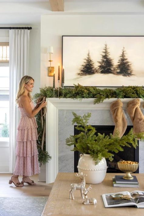 Team Picks From Brooke & Lou's Holiday Collection | Bria Hammel Interiors Classic Simple Christmas Decor, Back Of Chair Christmas Decor, Modern Fireplace Christmas Decor, Garland Mantle Christmas, Tv Console Christmas Decor, Simple Christmas Mantle Decor, European Christmas Decor, Fireplace Christmas Garland, Subtle Christmas Decor