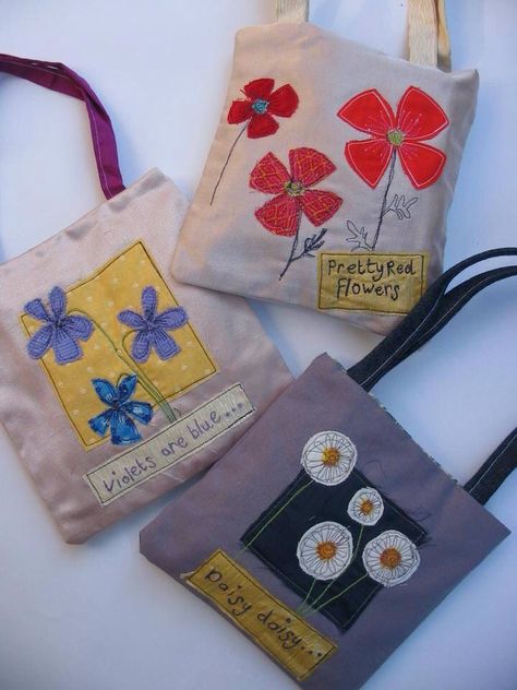 Flower bags by Poppy Treffry Poppy Treffry, Flower Bags, Textile Bag, Thread Painting, Flower Bag, Embroidered Fabric, Free Machine Embroidery, Purim, Embroidery Ideas