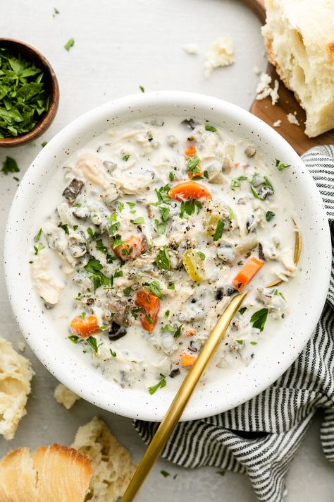 We can't get enough of this creamy Crockpot Wild Rice Soup made with tender bits of chicken, nutty wild rice, and a creamy broth. And we know you'll love it too. Made with wild rice, chicken, carrots, heavy cream, and seasonings. Easy Chicken Wild Rice Soup, Wild Rice Soup Easy, Postpartum Recipes, Postpartum Meal, Chicken And Wild Rice Soup, Chicken Carrots, Wild Rice Soup Recipes, Chicken Wild Rice, Wild Rice Recipes