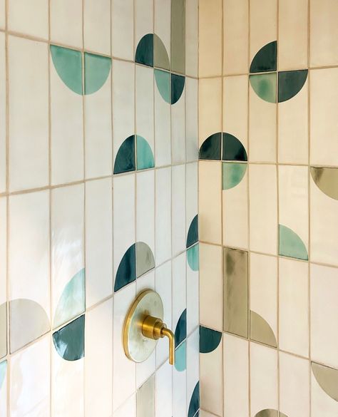 Subway tiles paired with handmade rectangular tiles can create a beautiful and interesting look in a shower. Bathroom Completely Tiled, Abstract Tiles Bathroom, Green Floor Tile Bathroom, Green Shower Tiles, Bathroom Inspo Aesthetic, Striped Bathroom Walls, Green Floor Tiles, Green Bathroom Tiles, Ceramic Shower Tile