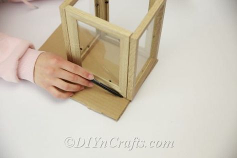 How To Make A Farmhouse Lantern From Inexpensive Picture Frames - Learn how to create a beautiful lantern from inexpensive picture frames. The video tutorial shows you how to create this farmhouse lantern for less than $10. Lantern From Picture Frames, How To Make A Lantern, Homemade Lanterns, Diy Lighthouse, 4 Picture Frame, Farmhouse Lantern, Small Picture Frames, Lantern Craft, Lantern Ideas