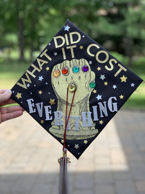 Avengers graduation cap thanos infinity gauntlet Thanos Graduation Cap, Avengers Graduation Cap, Marvel Graduation Cap, Marvel Graduation Cap Ideas, Graduation Cap Designs For Guys, High School Graduation Cap Designs, Graduation Things, College Grad Cap Ideas, Graduation Cap Decoration Diy