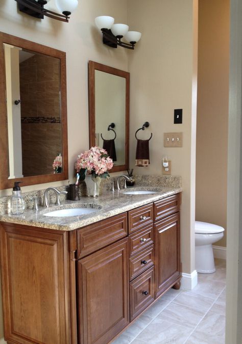 Shown here is a 2000 Tuscan-style bathroom with wood, maple cabinets, gold and cream granite countertops, a beige tile floor, beige walls, and oil-rubbed bronze fixtures. Great update ideas from Kylie M, Online Paint Color Consultant   #bathroomupdate #tuscanstyle #bathroomremodel #bathroom #diy #paintcolors #beige Venetian Gold Granite With Gray Cabinets, Venetian Gold Granite Bathroom, Cecilia Granite Countertops, Saint Cecilia Granite, Cream Granite Countertops, Santa Cecilia Granite, Venetian Gold Granite, Tuscan Tile, Color Consultant