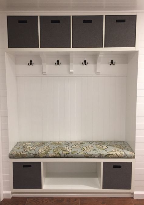 Our IKEA hack mudroom bench. We used two Kallax shelves, paneling and Ballard Designs Felicity fabric for the cushion. #ikeahack #ballarddesigns #mudroom Kallax Boot Room, Kallax Hack Entryway, Kallax Boot Room Hack, Ikea Kallax Hack Bench, Kallax Hallway Storage, Ikea Kallax Mudroom Hack, Kallax Shoe Storage, Kallax Mudroom, Kallax Hallway