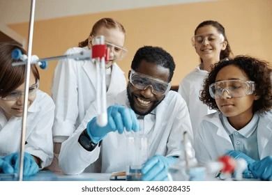 Cheerful African American Teacher Group Ethnically Stock Photo 2468028435 | Shutterstock Lab Photoshoot, Lab Experiment, Finance Education, Chemistry Class, Science Signs, Mother's Day Photos, Crop Image, Schedule Design, Stock Photography Free