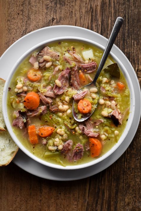 Smoked Ham Hock Bean Cabbage Soup (Garbure) - Pardon Your French Pork Hock Soup, Bean Cabbage Soup, French Soups, Recipes With Ham, Soup With Cabbage, Ham Hock Soup, Ham Hock Recipes, Ham Hocks And Beans, Cabbage Soup Diet Plan