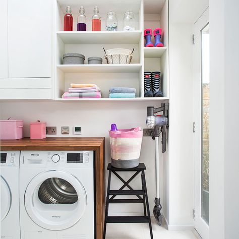 Neatly ordered utility room with access to garden