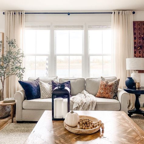 Styling In Front Of Living Room Window, Couch Along Window, Couch In From Of Window, How To Style 3 Windows In A Row, Picture Windows Living Room Curtains, Loveseat In Front Of Window, Curtains In Living Room Behind Couch, Curtains Living Room Three Windows, Couches Against Windows