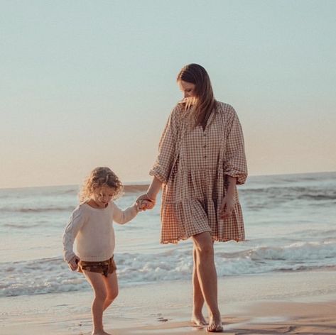 THE  LULLABY  CLUB on Instagram: “@kristenrichesphotography in our popular Avalon Smock Dress in Caramel Gingham 🥰🌊✨” Knee-length Beach Dress With Smocked Back, Vacation Gingham Dress With Smocked Back, Gingham Maternity Dress, Beach V-neck Smocked Dress, Julia Berolzheimer Maternity, Smock Dress, Smocking, Gingham, Cover Up