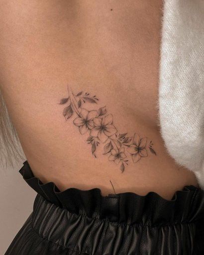 Asian Rib Tattoo, Water Lily Rib Tattoo, Orchid Side Tattoo Ribs, Hibiscus Rib Tattoo, Leaf Rib Tattoo, Floral Rib Tattoos For Women, Flower Tattoo On Hip, Underboob Tattoo Flower, Flower Tattoo Under Breast