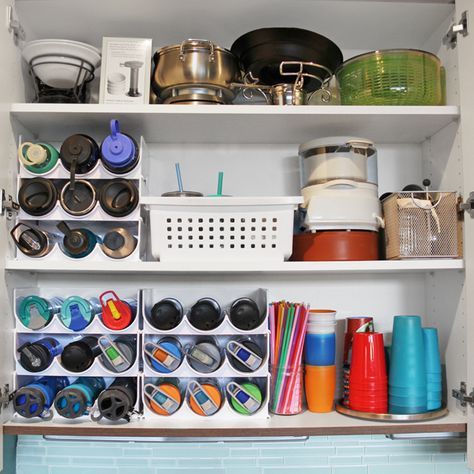 Water Bottle Storage solution! How to organized kitchen cabinets with quick five minute organizing projects. Perfect kitchen cabinet organizers for water bottles, plastic cups, straws, and more. Organized Kitchen Cabinets, Water Bottles Plastic, Kitchen Cabinet Organizers, Kitchen Cabinet Organization Ideas, Best Kitchen Design, Water Bottle Storage, Cabinet Organizers, Organized Kitchen, Stock Cabinets