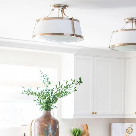 Keri Kuzma Interiors on Instagram: "Low ceilings? No problem. Though this client had standard ceiling height, we knew adding in hanging pendants would be obtrusive. We almost ended up scratching out island lighting all together but I really hated that idea. An island always deserves its own statement lighting. Instead, we opted for semi flush pendants to achieve the look! You may be struggling with this exact problem and this is a perfect solution! Design: @kerikuzma.interiors Photography: @fl Semi Flush Ceiling Lights Kitchen Island, Kitchen Island Pendant Light Low Ceiling, Semi Flush Mount Lighting Over Kitchen Island, Flush Mount Over Island, Flush Mount Kitchen Lighting Over Island, Kitchen Pendants For Low Ceilings, No Island Kitchen Lighting, Pendant Lights Over Kitchen Island Low Ceiling, Kitchen Lighting Ideas With No Island