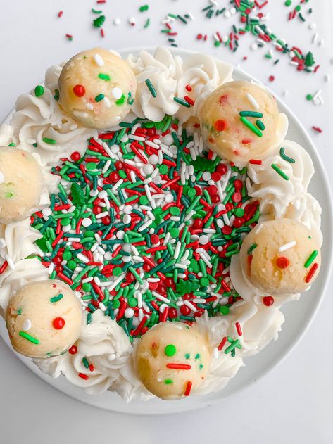 A festive cake that is best enjoyed during the holiday season! This cake is filled with holiday sprinkles, layered with an edible sugar cookie dough filling, and covered with a sweet vanilla buttercream. Christmas Cookie Sprinkles, Sprinkle Christmas Cake, Christmas Butter Sprinkle Cookies, Christmas Funfetti Cake Mix Cookies, Stacked Sprinkle Christmas Cookies, Edible Sugar Cookie Dough, Cookie Dough Filling, Holiday Sugar Cookies, Sugar Cookie Cakes