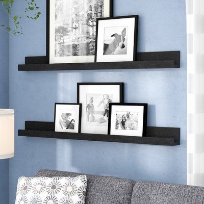 Photo Ledge Display Layout, Black Floating Shelves Living Room, Gallery Wall Picture Frames, Studio Display, Photo Ledge, Black Floating Shelves, Picture Gallery Wall, Framed Photos, Shelf Wood