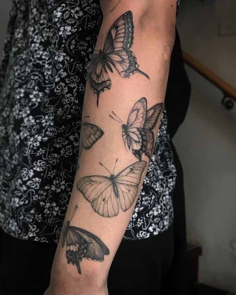 Butterfly Tattoos by Ed Taemets Butterfly Tattoo On Sleeve, Sleeve Of Butterflies Tattoo, Butterfly Patchwork Sleeve Tattoo, Butterfly Fill In Tattoo, Negative Butterfly Tattoo, Butterfly Collage Tattoo, Pinned Butterfly Tattoo, Nature Butterfly Tattoo, Butterfly Cluster Tattoo