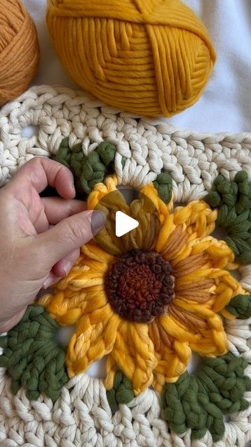 Caroline Langford - Floral Fiber Artist on Instagram: "Progress so far on this embroidered sunflower square 🌻  I grew a variety of sunflowers in my garden this year and I have loved seeing how different they all are! The centers and petals are all unique, so I had fun approaching this sunflower piece with different details than I did with my first sunflower piece. I just need to finish the center and petals and then it will be complete! I’m also considering adding a border to these squares…haven’t decided yet.  What do you think so far?  Love always, Caroline  #thehappyhomecollective #foreverflowers  #flowerweaving #etsyshop #crochetersofinstagram #floralgrannysquare #flowercrochet #ihavethisthingwithflowers #crochetinspiration #craftinspiration #bigcrochet #sunflowerlove" Sunflower Granny Square Pattern, Sunflower Quilts, Crochet Sunflower, Fiber Artist, Forever Flowers, Afghan Crochet, Granny Squares Pattern, Afghan Crochet Patterns, Love Always