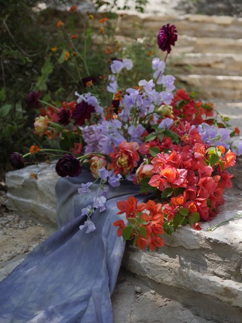 Raw silk dyed with natural substances from the earth by Seda Medicina of Austin, TX | Floral by Color Theory Collective | Lavender, Ochre, Coral, Plum, Dusty Blue, Beige | Sweet peas, double tulips, ranunculus, bougainvillea  | Austin, TX | Weddings, Bouquet, Bridal Bouquet, Centerpiece, Colorful Bouquet Wedding Bougainvillea, Tulips Wedding Bouquet, Color Theory Design, Aisle Florals, Boutineer Wedding, Sweet Pea Bouquet, Double Tulips, Unique Wedding Colors, Bouquet Centerpiece