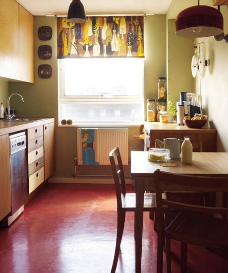 Kitchen w red floors and green walls.. something I like about it. Photographs: Rachel Smith 1960s Flat Interior, 60s Flat Interior, Council Flat Interior, Council House Interior, Council Flat Renovation, Red Floor Kitchen, Red Floors, Red Flooring, Small Flat Interior