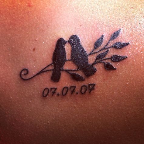 Love birds shoulder tattoo with anniversary date. Love Bird Matching Tattoos, Love Birds Tattoos, Husband And Wife Bird Tattoos, Birds Heart Tattoo, Love Bird Tattoos For Women, Love Birds Tattoo Couples, Wedding Anniversary Tattoo Ideas, Lovebirds Tattoo, Anniversary Date Tattoo